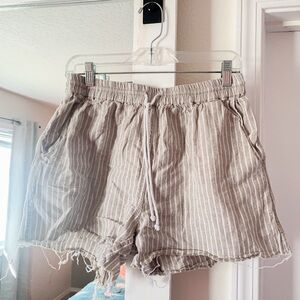 Frayed-edge, high waisted linen shorts